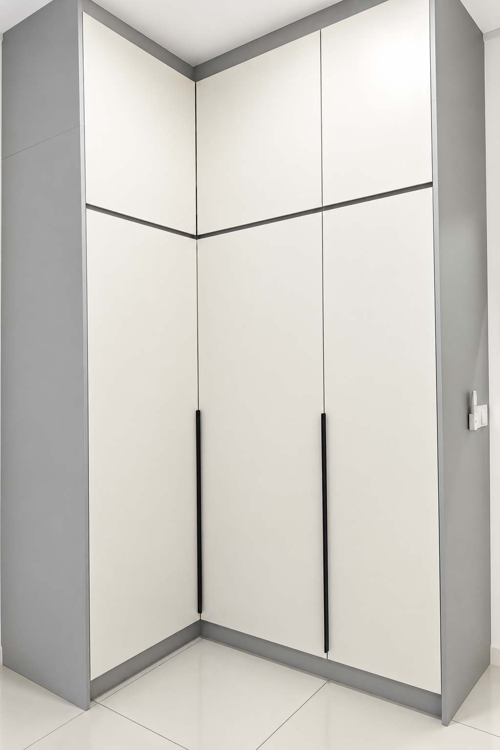Custom full-height corner wardrobe with dark handles